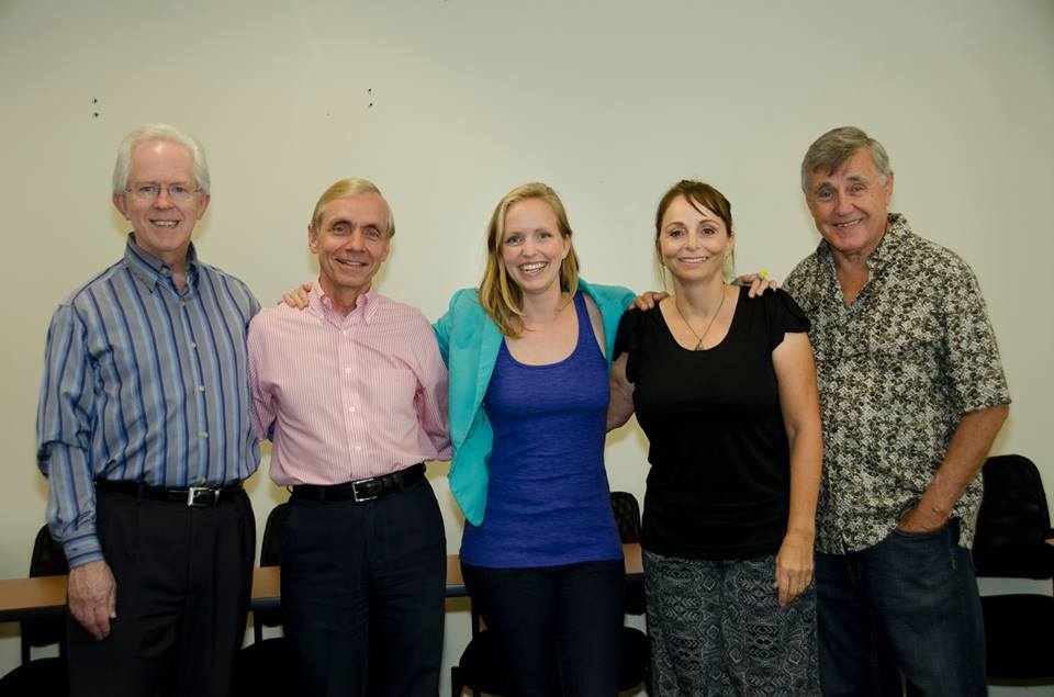 photo of Sonja with her family (on left, her stepfather and father; on right, her mother and stepfather)